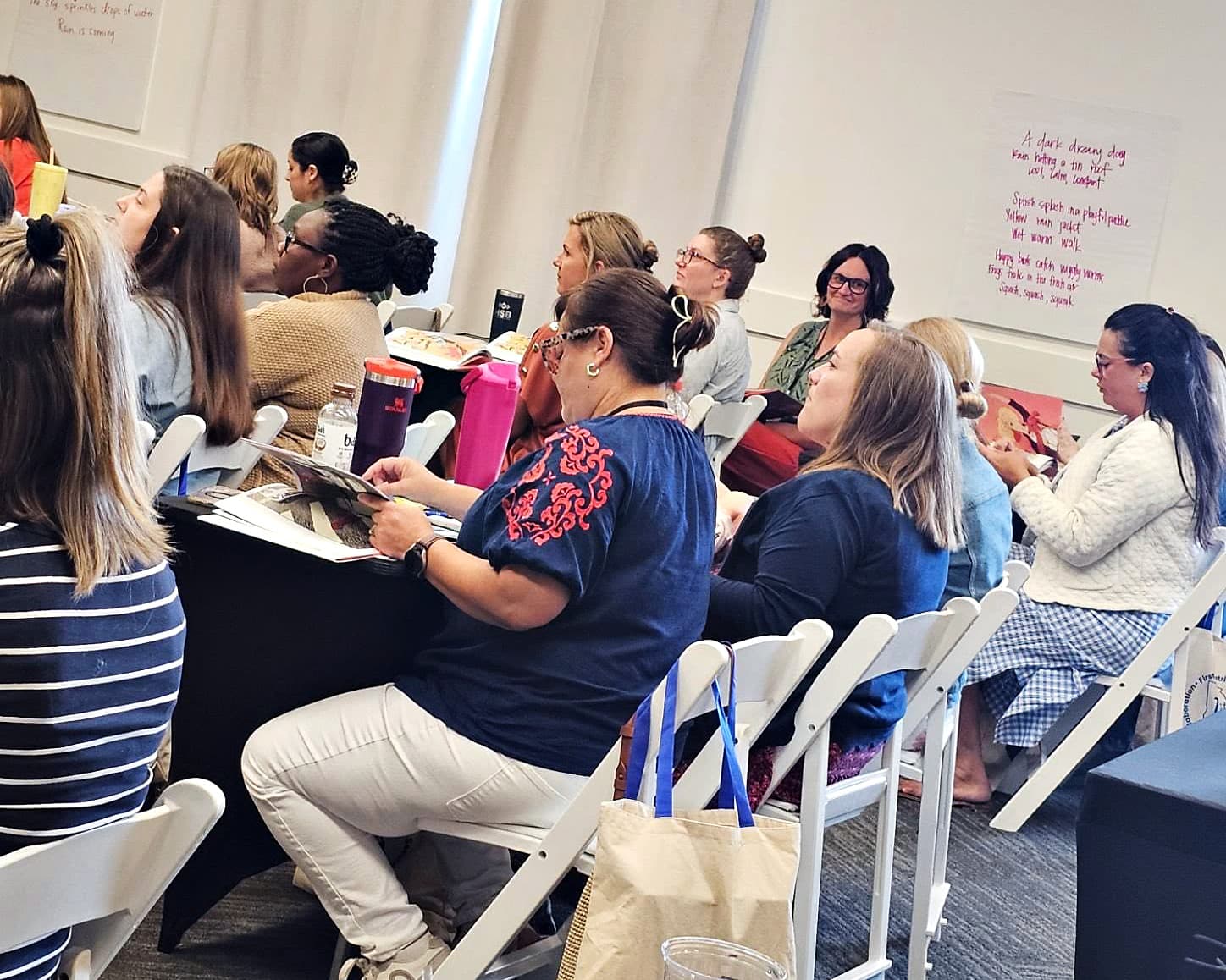 Educators seated together during a training session